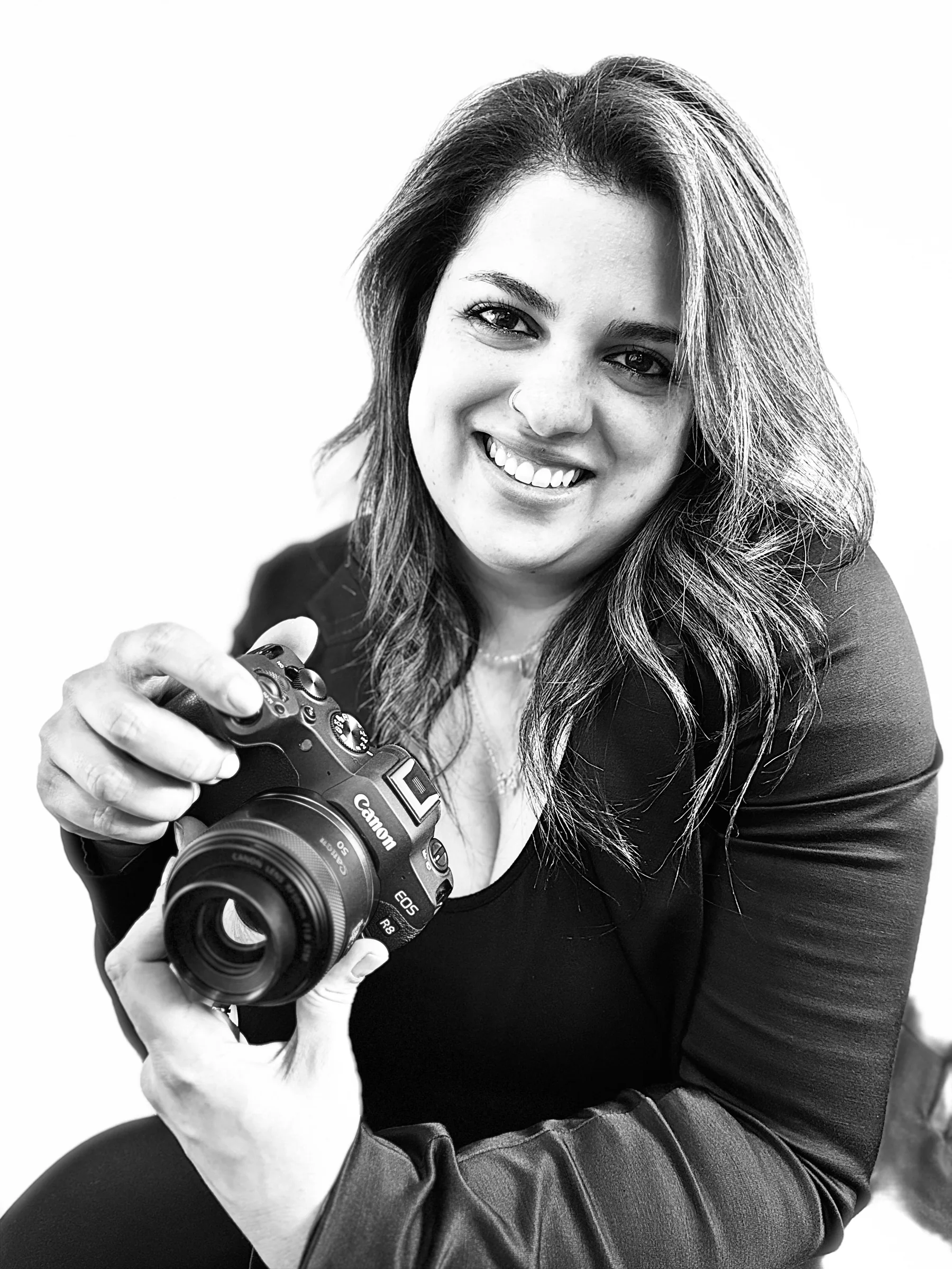 Mahara holding her camera